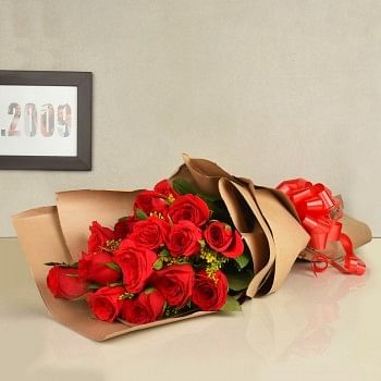 15 Red Roses wrapped in Special Paper