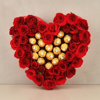 Heart Shaped Arrangement of 40 red roses with Ferrero Rocher Chocolate (16 Pcs)
