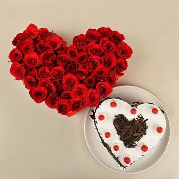 Heart Shaped Arrangement of 40 Red Roses with 1 kg Heart Shape Black Forest Cake