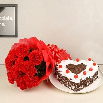 12 Red Carnations with 1 Kg Heart Shape Black Forest Cake