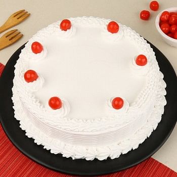 Half Kg Vanilla Cream Cake Topped with Cherries
