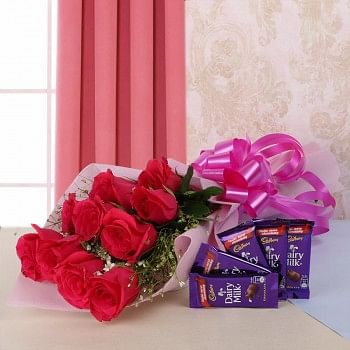 10 Hot Pink Roses in Pink Paper and Pink Bow with 5 Dairy Milk Chocolates (13gms each) for Mothers Day