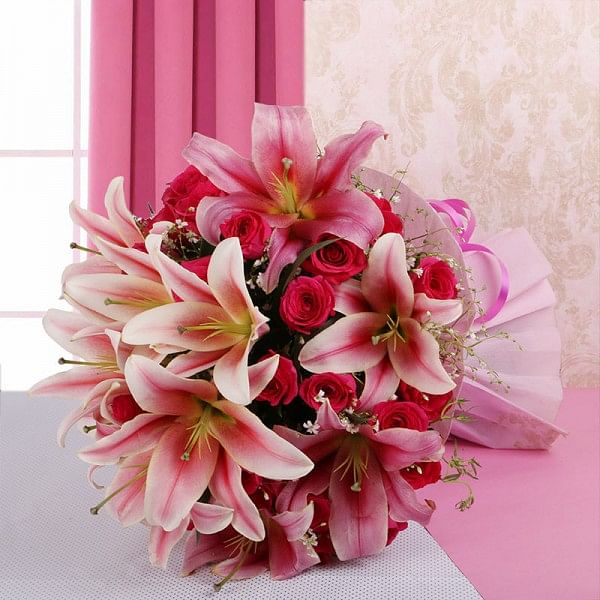 15 Hot Pink Roses with 8 Oriental Pink Lilies in Paper Packing