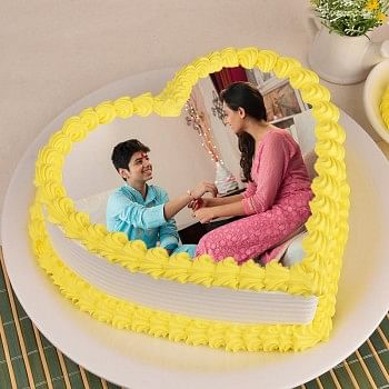 1 Kg Heart Shape Photo Pineapple Cake for Raksha Bandhan