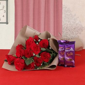 12 Red Roses in Brown Paper, Jute Thread with 2 Cadbury Silk Chocolates (60gms each)