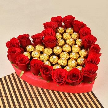 Heart Shaped arrangement of 20 red roses with Ferrero Rocher Chocolate (24 pcs)