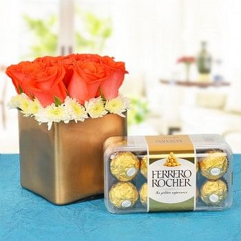  9 Orange Roses In A Special Golden Vase with 16 pcs Ferrero Rocher