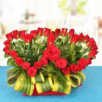 A Basket Arrangement of 40 Red Roses
