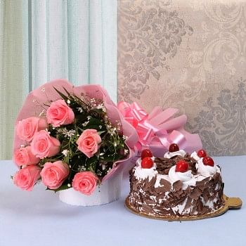 8 Pink Roses in Pink paper packing with Half Kg Black Forest Cake