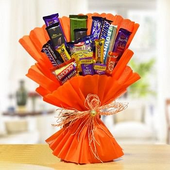 Bouquet of Chocolate and Wafers (Snacks Bouquet consisting of - 1 Bikano's Aloo Bhujia (40 gms) - 2 Cadbury's Dairy Milk (13 gms each) - 1 Haldiram's Moong Daal (40gms) - 1 Nestle's KitKat (13gms) - 2 Cadbury's 5 Star (19 gms each) - 2 Snickers (50 gms ea