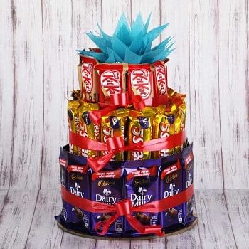 Chocolate Tower arrangement of 12 Cadbury's DairyMilk Chocolates (14gms each), 12 5-Star Chocolates (22gms each) and 10 KitKats (12gms each)