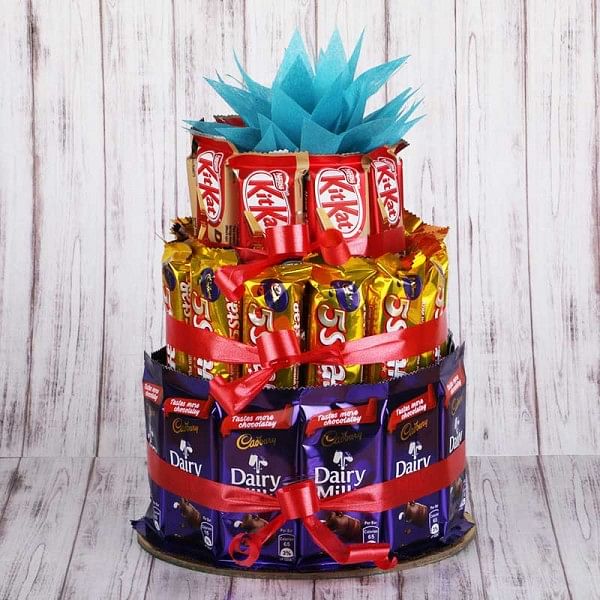 Chocolate Tower arrangement of 12 Cadbury's DairyMilk Chocolates (14gms each), 12 5-Star Chocolates (22gms each) and 10 KitKats (12gms each)