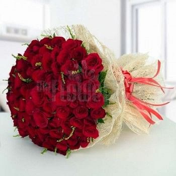 100 Red Roses with Jute Packing
