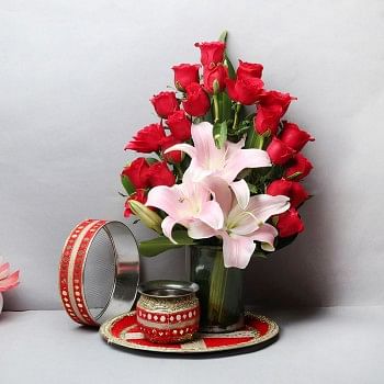 20 Red Roses and 3 Asiatic Pink Lilies with Glass Vase Arrangement and One Designer Pooja Thali Set