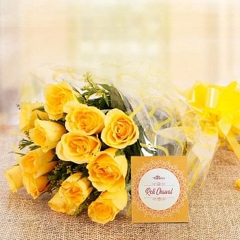 10 Yellow Roses in Cellophane Packing with One Pack of Roli Chawal