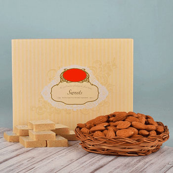 Kaju Katli (500 gms) and A Cane Basket containing Almonds (100 gms)