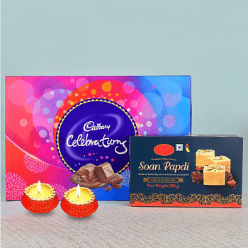 A Pack of Soan Papdi (250 gms) with 1 Cadbury Celebrations Pack (114 gms) and Set of 2 Diya for Diwali