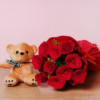10 Red Roses in Paper Packing with Teddy Bear 6 inches