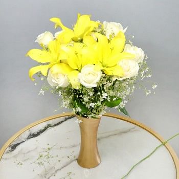6 Pink Roses and 3 Yellow Asiatic Lilies in a Glass Vase