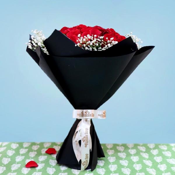 Roses in Black Paper Packing
