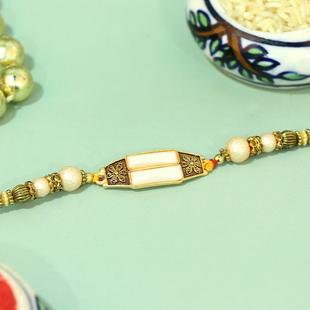 Elegant Pearl Bracket Rakhi