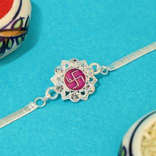 Devotional Silver Swastik Rakhi