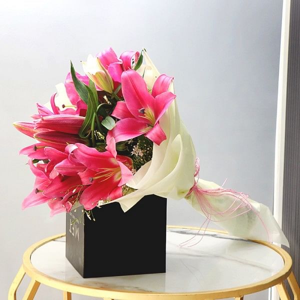 5 Asiatic Pink Lilies wrapped in cellophane paper
