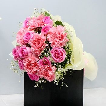  10 Pink Roses and 6 Pink Carnations with Paper Packing
