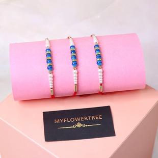 Adorable Set Of Pearl Rakhi